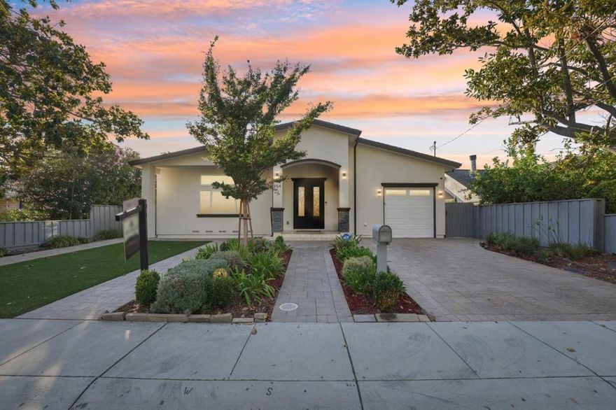 Nestled in the desirable Rex Manor area of Mountain View, this beautifully renovated single-story contemporary home offers a stunning open floor plan filled with natural light. Perfect for entertaining and everyday living, this thoughtfully designed residence combines modern elegance with practical comfort. The spacious living room features wood flooring, large windows, a cozy fireplace, and 10-foot-high ceilings, creating a bright and welcoming atmosphere. The gourmet kitchen boasts top-of-the-line stainless steel appliances, custom cabinetry, slab quartz countertops, and a spacious island ideal for large gatherings. This home includes four en-suite bedrooms, with many baths featuring dual sinks and sleek light fixtures. The luxurious master suite offers a walk-in closet and an elegant marble bath with a separate tub and glass shower stall, providing a private retreat. Distinctive features include new interior/exterior paint, central heat & A/C, double tankless water heaters, EV charger, wood flooring throughout, low-maintenance front & back yards and much more. Located in an incredible area close to Google headquarters, major tech companies, downtown Mountain View, and easy access to highways 101 & 85. Zoned for the highly acclaimed Los Altos schools!!  Your dream home awaits!
