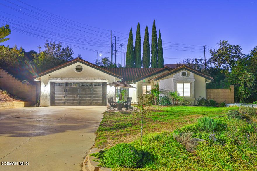 Welcome to this beautifully remodeled single-story home, offering 4 bedrooms and 3 bathrooms at the end of a quiet cul-de-sac in Moorpark. Tucked away on a peaceful street, this home combines thoughtful design with modern finishes in every detail.Wood-look tile flows seamlessly throughout, setting the stage for an open-concept layout perfect for everyday living and entertaining. The kitchen is truly the heart of the home, with new shaker-style cabinetry, brushed brass hardware, white Cafe appliances, a custom hood, Quartzite countertops and an oversized island with seating and plenty of storage. It opens to the spacious family and dining rooms, creating a great-room feel that's ideal for gathering with family and friends.Step outside through dual sliding doors to a beautifully landscaped backyard featuring a covered patio and built-in fireplace with ample seating--an inviting space to enjoy Moorpark's cool evenings and stunning sunset views.The primary suite is a private retreat with custom trim moulding, built-in storage, and a recently upgraded ensuite bathroom with Zellige and marble tile, dual sinks, and a glass-enclosed shower. Two additional bathrooms have also been tastefully remodeled, complementing the three secondary bedrooms.  Upgraded double-paned windows throughout.Located close to award-winning schools, parks, shopping, and dining, this home is move-in ready and waiting for its next chapter.