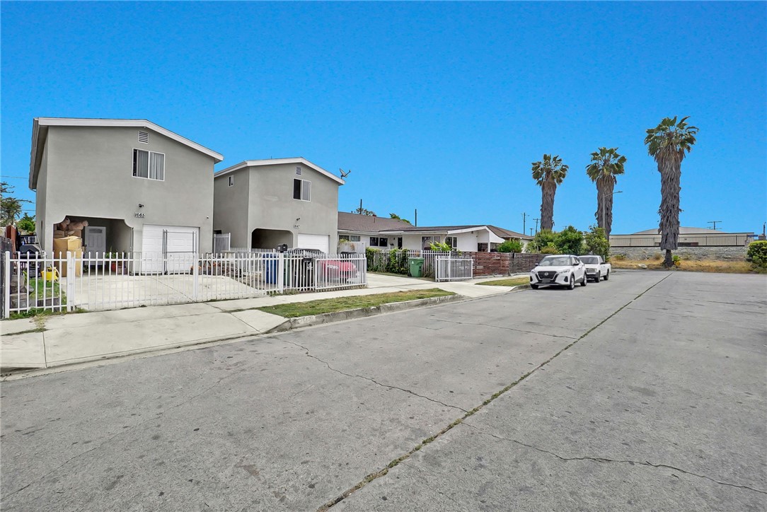 RARE GEM!!! BUILT in 2021!!! This modern new construction home features 5 bedroom, 3 bathroom. Single family home located in the heart of Los Angeles. This two-story residence offers 1,888 square feet of thoughtfully designed living space, ideal for families or investors seeking a move in ready property with great income potential. The first floor features a large living and dining area perfect for entertaining, along with a bedroom that includes a private entrance and a full bathroom, ideal for guests, extended family, casita or potential rental income while living at the house. Beautifully designed kitchen with sleek quartz countertops and modern cabinetry. Upstairs, you'll find four additional bedrooms, including both a primary and a junior primary suite, each with its own en suite bathroom, offering comfort and privacy or extra income. The home is finished with hardwood flooring throughout, central heating and air conditioning. Parking is convenient with a carport, one car garage and driveway providing ample space for a total 4 cars. The backyard provides a seclude and private relaxing area for the sunny days, great to BBQ. Situated on a 2,504 square foot lot in the Florence-Graham neighborhood, the home is just a 4-minute walk from Firestone Station and Washington Park, offering easy access to public transit. It's also 15 miles to LAX, 6 miles to Sofi Stadium and USC, making it very convenient for yourself or as a great rental. Zoned LCR3*, the property presents future development potential or additional rental opportunities. The property will be delivered vacant and ready for immediate occupancy. Don’t miss this exceptional opportunity to own a turnkey home in a vibrant Los Angeles community. It won't last. $648,000 OR TRADE!!!!