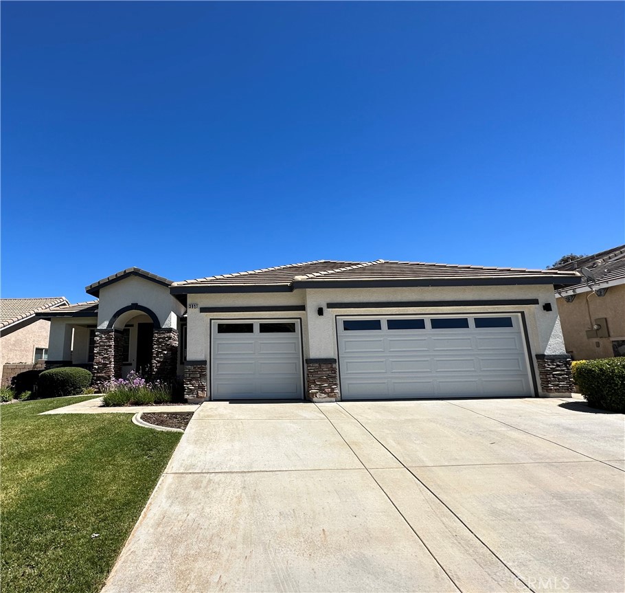 Welcome to this charming single-story home tucked away on a peaceful street in the heart of West Palmdale. Offering 3 bedrooms and 2 bathrooms across 1,883 sq. ft. of living space, this residence blends comfort and style in every detail.
The updated kitchen features sleek stainless steel appliances, while the spacious family and living rooms provide the perfect settings for cozy nights by the fireplace or entertaining guests. Curb appeal greets you with a welcoming front porch, and the 3-car garage ensures ample parking and storage.
The primary suite is a true retreat, complete with double doors, vaulted ceilings, and private backyard access. Its en-suite bathroom includes dual sinks, a separate soaking tub and shower, and a walk-in closet. Additional highlights include ceiling fans in every bedroom, a dedicated laundry room, and a covered back patio with a tranquil water feature.
Conveniently located near shopping, schools, golf, the Antelope Valley Mall, the 14 freeway, and just minutes from Quartz Hills—this home places everything you need within easy reach.
Don’t miss the opportunity to make this delightful West Palmdale property your next home!