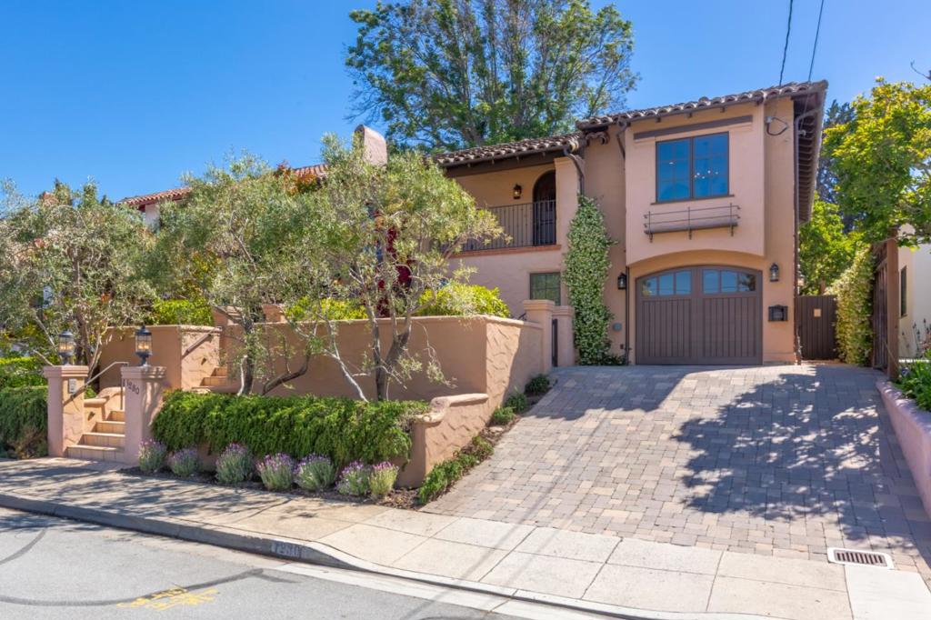 Welcome to a beautiful gem in the Homestead neighborhood! This 1930's home was completely rebuilt in 2009 with quality craftsmanship preserving many details and old world charm of the original Mediterranean style. This home adorns oak and limestone flooring throughout, limestone countertops, wooden beam ceilings and a long list of designer appliances. The inverted floor plan provides treetop views from the living room, formal dining room, kitchen & family room. One en suite bedroom is on the main living level and the other two as well as an office/flex space occupy the lower level of this home. Through french doors you'll delight in an outdoor oasis complete with kitchen, bar seating and a fire pit for entertaining. Hydronic/Radiant heating, solar panels, EV hookup.