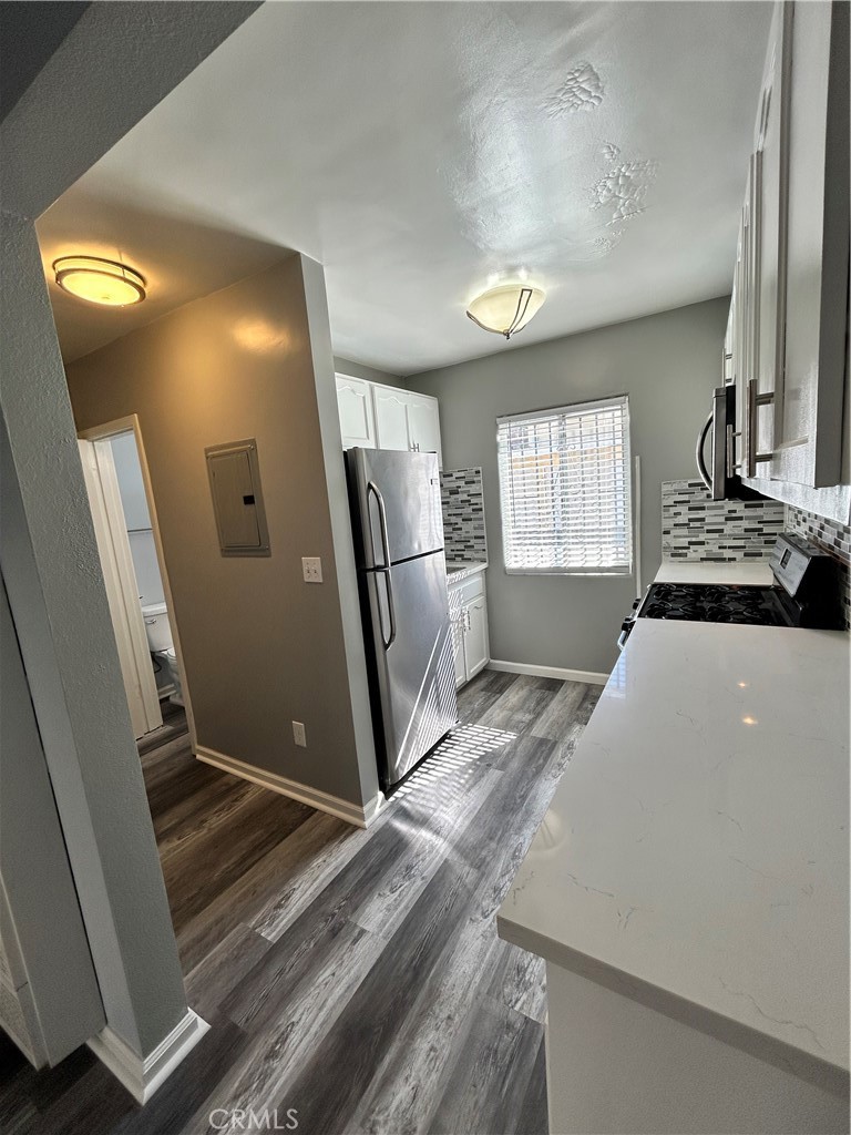 Our office is proud to present this beautiful and well maintained studio home for lease. This unit has been remodeled and has a stainless steel stove, microwave, and refrigerator. Laminate flooring is present throughout the unit. There is one off street parking space. The first month rent is free and all utilities are paid by the landlord.