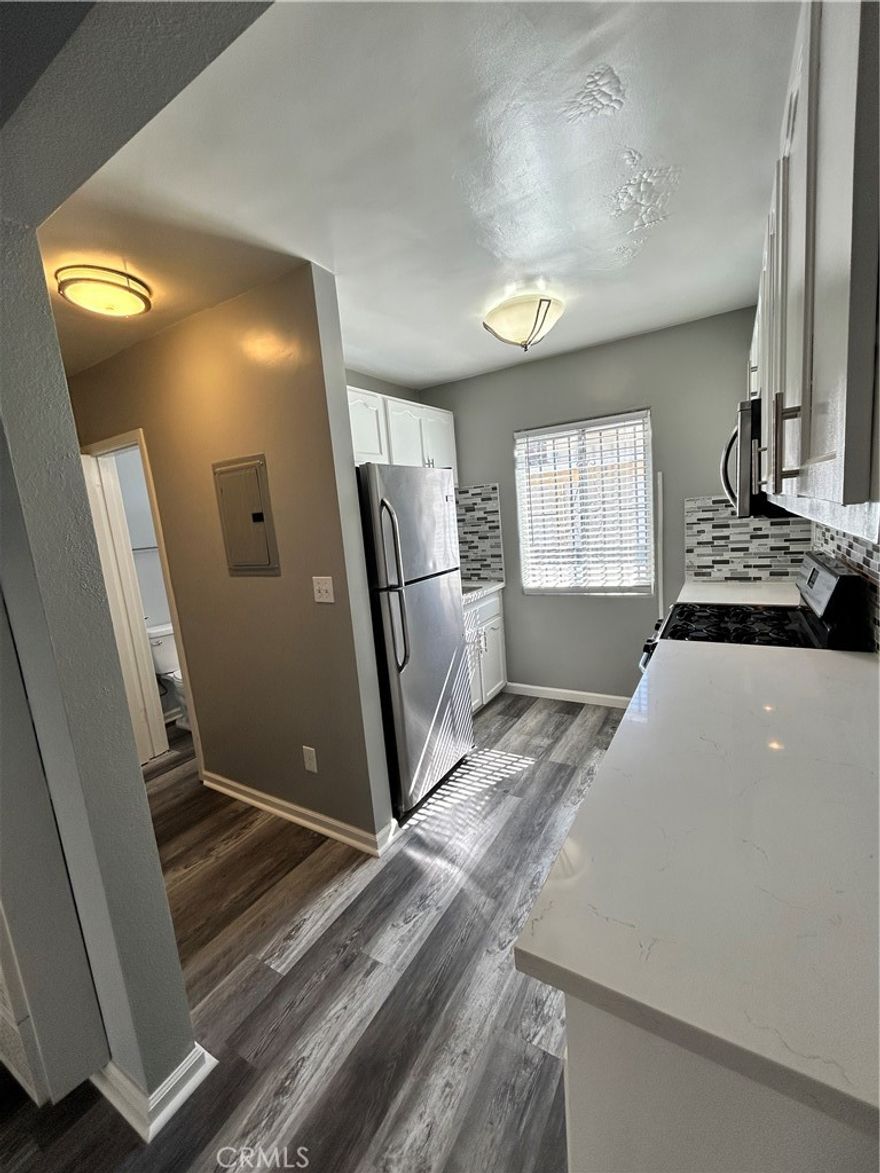 Our office is proud to present this beautiful and well maintained studio home for lease. This unit has been remodeled and has a stainless steel stove, microwave, and refrigerator. Laminate flooring is present throughout the unit. There is one off street parking space. The first month rent is free and all utilities are paid by the landlord.