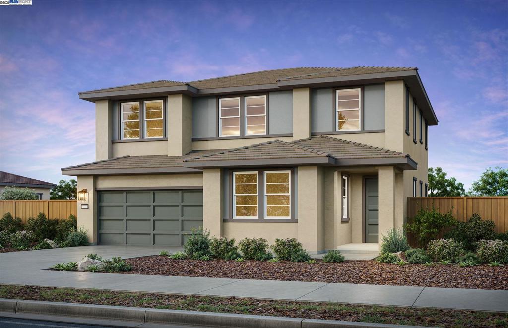 Plan 2 is an open-concept floor plan offering a covered patio, spacious loft, quartz kitchen countertops, white cabinetry, stainless steel appliances, luxury vinyl plank flooring and included solar. This home will be ready in Oct-Nov 2025. *Photos are of model home, not actual home*
