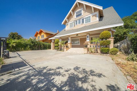 Photo of 1417 12th Avenue, Los Angeles, CA 90019 (MLS # 26639967)