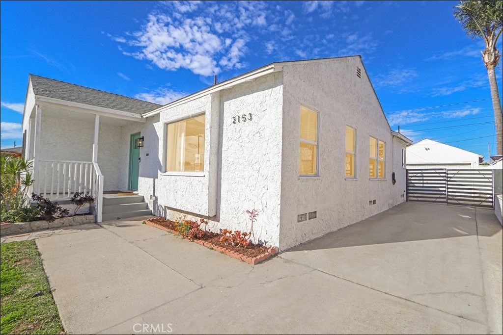 Photo of 2153 W 111th St, Los Angeles, CA 90047 (MLS # OC26001874)