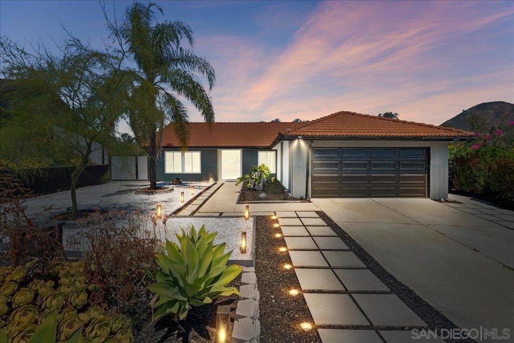 Nestled high on a coveted view street in the peaceful San Carlos neighborhood, this modernized, fully upgraded single-story home sits on a spacious 0.38 acre private lot, offering exceptional tranquility and outdoor space that is rarely available in the area. The light-filled layout spans approximately 1,738 square feet and features 3 bedrooms, 2 bathrooms, and an attached 2 car garage. Step inside to find well maintained tile flooring, central air conditioning, and stylish finishes throughout. The kitchen boasts modern white cabinetry, granite countertops, and ample storage, combining functionality with timeless design. Out back, a large view deck provides the perfect setting for outdoor dining or simply enjoying the serene surroundings. The expansive lot offers endless possibilities for landscaping, gardening, or even future expansion. Located on a quiet residential street, this home is just minutes from Lake Murray, Mission Trails Regional Park, shopping, dining, and excellent local schools. Enjoy the perfect balance of suburban comfort and outdoor adventure in one of San Diego's most desirable communities.