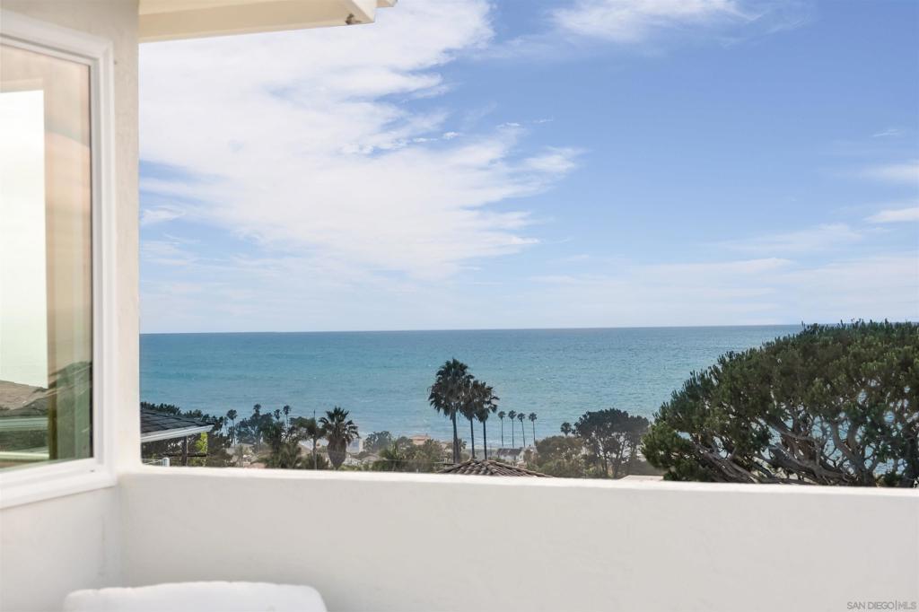 Imagine waking up just steps from the ocean, where every morning begins with the sound of waves and every evening ends with breathtaking sunsets over a legendary surf spot & walking trails. This stunning Sunset Cliffs home invites you in with a chef’s kitchen, complete with stainless steel appliances, a 6-burner stove, and waterfall granite, that overlooks endless ocean views framed by new dual-pane windows. Relax in your luxurious primary suite featuring an expansive walk-in closet, soaking tub, oversized shower, and a private deck perfect for savoring those magical coastal sunsets. With a dedicated office and interior laundry, this home effortlessly blends work and play. Designed to host unforgettable gatherings, the spacious driveway welcomes cars, boats, and your closest friends. But beware, your friends may not want to leave. This isn’t just a home, it’s your everyday escape to coastal bliss in one of San Diego’s most coveted neighborhoods. Ready to live the dream?
