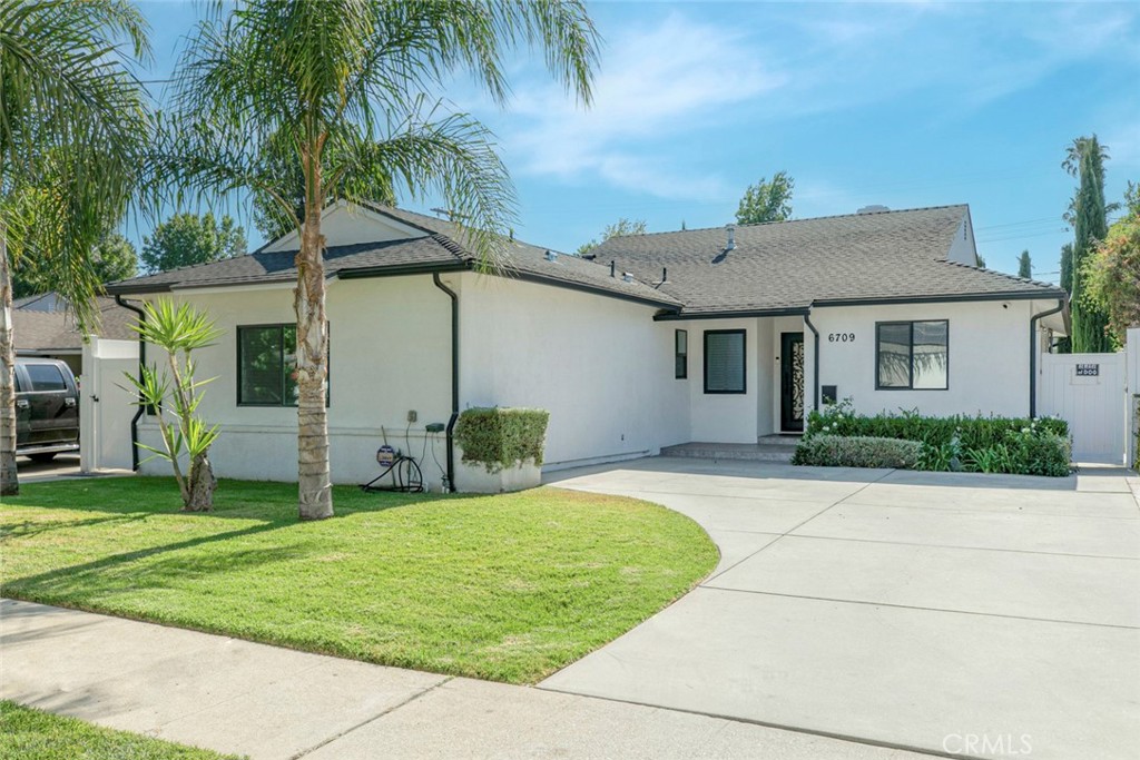 Remodeled Valley Glen Home with ADU and Income Potential - This stylishly remodeled home in Valley Glen offers a spacious open layout with tasteful upgrades throughout. The living room features newer flooring, a modern fireplace, and a large front window that brings in plenty of natural light.
The updated kitchen includes stone countertops, shaker-style cabinets, recessed lighting, and stainless steel appliances—gas stove, dishwasher, and double sink.
The light-filled family room opens to the backyard through sliding glass doors, making it a great space for gatherings and entertaining. There are 3 Bedrooms and 2 bathrooms with a walk-in closet in one of the bedrooms and a private bathroom in the other bedroom.
A fully permitted Junior ADU with a private entrance and full bathroom is included. The property also comes with approved RTI plans to build a 2-story, 1,000 sq ft ADU and a 1-story, 708 sq ft ADU—an excellent opportunity for investors or anyone looking to create additional living spaces or rental income.