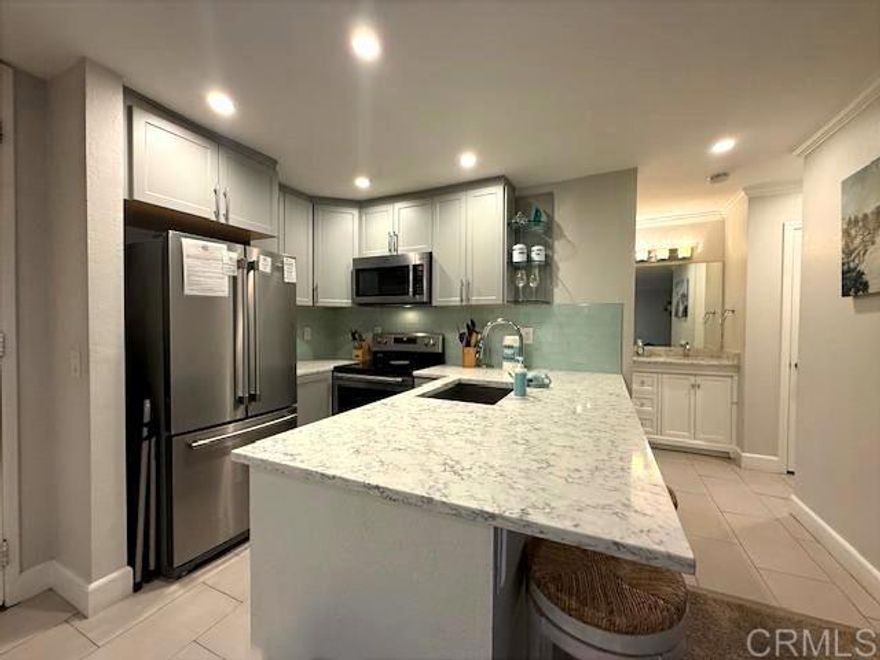 Oceanfront Resort Living in Oceanside, CA. Live the ultimate coastal lifestyle in this beautifully updated 1-bedroom, 1-bathroom condo located in one of Oceanside’s premier beachfront gated communities with direct beach access! Step inside to discover an updated kitchen featuring quartz countertops, stainless steel appliances, recessed lighting, and new cabinets—a perfect blend of modern style and coastal charm. The updated windows and sliding glass door fill the space with natural light and fresh ocean breezes. The living area offers a versatile Murphy bed, ideal for guests, while the updated bathroom boasts a new vanity with quartz countertops and a tiled walk-in shower for a spa-like experience. Enjoy resort-style amenities that make every day feel like a vacation: Two sparkling pools & three spas, world-class fitness center with sauna, locker rooms & billiards room, putting green and lush tropical landscaping, 24-hour security within a fully gated complex. With short-term rentals allowed, this property offers incredible flexibility—use it as your beach getaway, full-time residence, or a high-performing investment opportunity. Experience Oceanside’s vibrant coastal lifestyle—steps to the sand, the pier, harbor, restaurants, and entertainment.