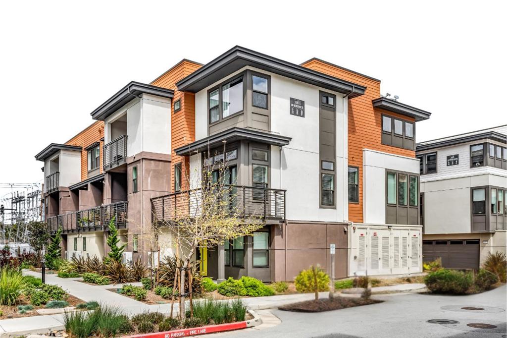 Welcome to 133 Waters Park Circle, a stunning 2-bedroom, 2.5-bath townhome-style condo in San Mateos vibrant Marina Lagoon neighborhood. Built in 2022, this 1,546 sqft home features over $70K in upgrades and owned solar panels. Enjoy open-concept living with luxury vinyl floors, recessed lighting, and a stylish kitchen with granite countertops, matching cabinetry, stainless steel appliances, and a large center island. The spacious primary suite offers a walk-in closet, private balcony, and sleek en-suite bathroom. A second en-suite bedroom provides comfort and privacy. Additional highlights include a half-bath on the main floor, in-unit laundry, a two-car tandem garage, and a covered deck perfect for relaxing. Located in Pultes "One 90" community, residents enjoy access to walking trails, a dog park, community garden, and nearby shops, dining, and major highways. Modern comfort, prime location. Don't miss this opportunity!