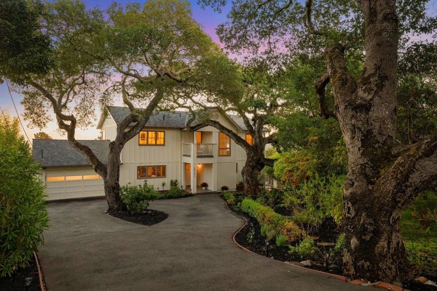 Showcasing sweeping bay-and-hill views & incredible indoor-outdoor spaces, this light-filled Belmont retreat sits on a park-like lot 11,000± sq ft with lush lawn & mature trees. With 4 bedrooms plus a formidable office, expansive decks for entertaining, & astounding views, this home blends comfort with functionality. An extra-long driveway welcomes you & buffers the home from the street. Inside, the main level features an open living/dining/kitchen layout with hardwood floors & a separate family room, both open to a sprawling deck. The remodeled kitchen is anchored by an oversized island and offers new counters, gas oven & stove, two sinks, and abundant storage. A ground-floor bedroom and full bath accommodate guests or multi-generational needs. Upstairs, find two large guest bedrooms, an office, & a generous primary suite; all open to a long view balcony. The hall also accesses a front-facing balcony. Fresh interior paint & brand-new carpet upstairs make the home move-in ready. Out back, the lot unfolds like a private park with level expansive lawn & mature trees ideal for play, pets, & gatherings. Enjoy Bay & hill views and watch 4th of July fireworks from the decks! The extra large 2-car garage makes parking and storage easy! Close to top Belmont schools, parks, and shopping!