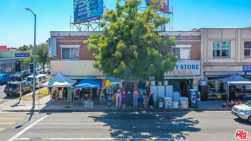 Prime corner lot with excellent visibility and high traffic! This C2-zoned mixed-use property features 4 commercial units, 5 residential units, and a billboard for additional income. The property sits on a lighted corner lot with a security camera system installed for added safety.Located in a bustling area, just 2 miles from USC, this property offers strong income potential and future development opportunities with the potential to add up to 4 additional units in the rear (buyer to verify). Ideal for investors looking for steady income and long-term growth in a central Los Angeles location