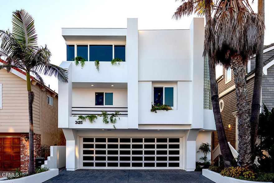 Welcome to your modern dream coastal retreat.  This three story oceanfront home in desirable Hollywood Beach offers the perfect blend of luxury, space and unbelievable views.  Elegantly designed with skylights and glass block walls, an impressive entry foyer opens to a wide circular staircase leading to the second and third floors.  On the first floor you will find two bedrooms with ocean views and a spacious full bath.  The second level open concept living area which boasts 180 degrees of ocean views includes a fireplace, built-in media cabinets, spacious dining area with oceanfront deck and an exceptionally appointed kitchen with SubZero refrigerator, five burner gas cook top with downdraft, combination microwave/wall oven, expansive euro-style cabinets and convenient island topped with granite.  A bathroom with glass block curved walls is across from a walk-out balcony that overlooks the street side of the property.  Next to the kitchen is a utility room with washer, dryer and laundry chute.  The top floor master suite is absolutely stunning with fireplace and ocean view deck.  There is a cozy lounge area between the bedroom and home office with built-in deck topped with granite.  You will appreciate the extra large walk-in closet with custom cabinetry. The master bath has a large stand-in shower and jetted soaking tub both positioned to enjoy ocean views.  Other amenities include a security system, an oversized 2 car garage, a tank-less water heater and a Halo whole house water filtration and conditioning system.  So, whether you're entertaining on the sand, relaxing in the ocean view master suite or hosting guests in the open concept living space, every moment here is enhanced by the sound of waves and sea breezes.  Don't miss this rare opportunity to own a slice of California beachfront paradise.