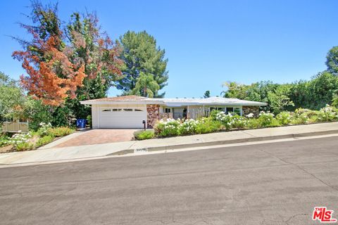 Photo of 24648 Eilat Street, Woodland Hills, CA 91367 (MLS # 20599726) Photo of 24648 Eilat Street, Woodland Hills, CA 91367 (MLS # 20599726)
