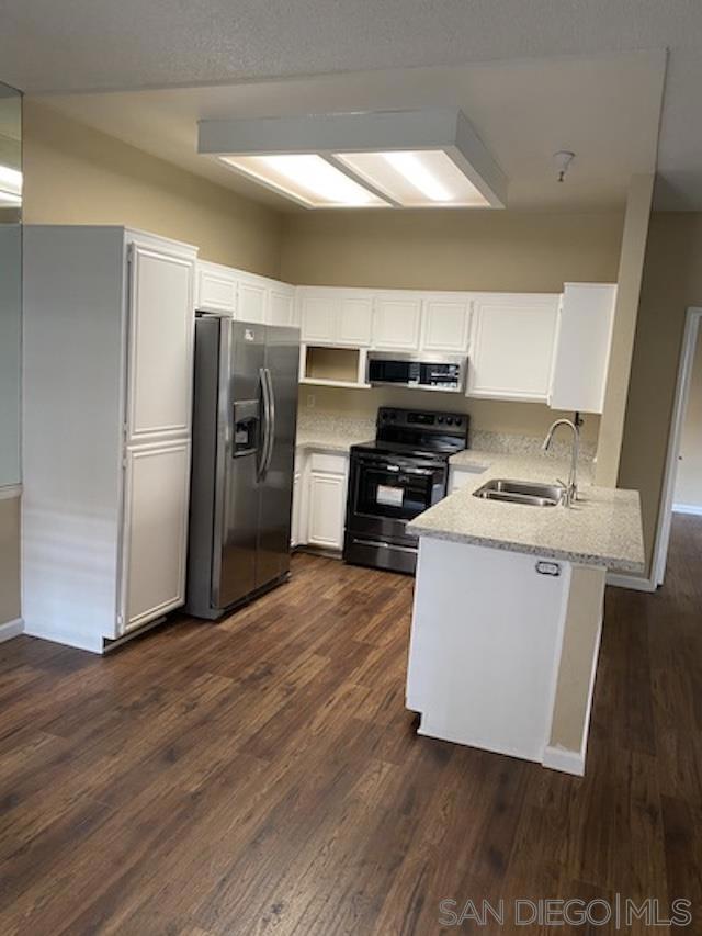 Upgraded two bedroom condo in highly desirable 'The Summit' community New paint, New shower heads. Ground level unit features an open floor plan with large kitchen that opens into dining area and living room. Master bedroom features large walk in closet and private bathroom. 2 parking spots one carport and one assigned.. The community amenities include 2 pools & spa, exercise room/ gym, gated tennis court & clubhouse and visitor parking. Located conveniently close to Poway schools, Rancho Bernardo & 4S Ranch shopping.