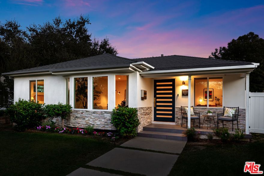 Located South of the 101 in one of Encino's most desirable pockets, this thoughtfully renovated 3-bedroom plus separate office, 3-bathroom home offers a stylish and functional layout ideal for modern living. Set adjacent to the prestigious Amestoy Estates, the home sits within a close-knit neighborhood known for its strong sense of community and annual traditions, including a fun filled Halloween celebration that draws neighbors together year after year. Inside, vaulted ceilings and wide-plank oak flooring create an open, light-filled atmosphere. The designer kitchen features quartz countertops, stainless steel Fisher & Paykel range and built-in refrigerator, a center island with seating, plus custom cabinetry bringing together form, function, and everyday comfort. The vaulted primary suite offers a spacious en-suite bath with dual sinks and premium finishes. Two additional bedrooms share a second full bathroom, and with an additional separate powder room. Sliding doors open to a private backyard patio surrounded by mature fruit trees and lush landscaping. The detached garage offers potential for a gym, workspace, or future ADU. Located in the award-winning Encino Charter Elementary School boundary and just moments from Ventura Blvd, Gelson's market, Lake Balboa park, three golf courses, and commuter routes, this is an opportunity to live in a beautifully updated home in a neighborhood where connection and community truly matter.