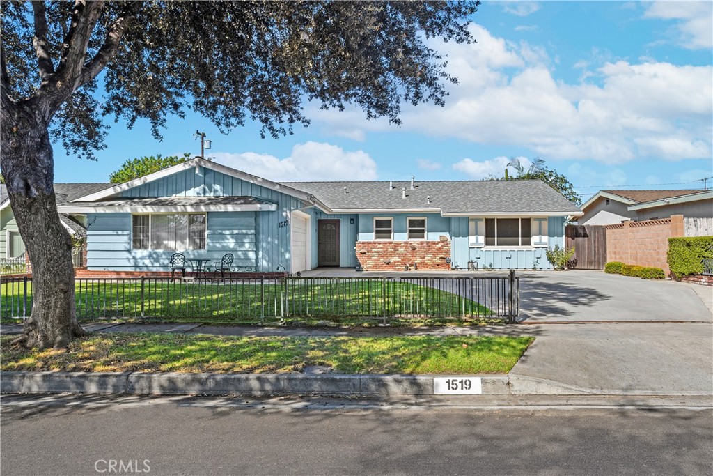 Love at first sight! Mid century charm meets modern luxury here at 1519 Lovering Avenue! Welcome to your new postcard-perfect home in one of Fullerton’s most storybook looking neighborhoods. Every inch of 3 bed, 2 bath gem is light-filled and balances comfort with style, all within a well thought out, open floor plan. You’ll love the show-stopping, newly remodeled kitchen that looks like it’s straight out of a magazine! This high end, breathtaking space has an impressively large island, gorgeous cabinets, designer finishes, premium state of the art appliances, and an effortless flow for entertaining. The kitchen feeds right into the dining room area, where the elegant brick fireplace and the fabulous wood-beamed ceiling will elevate all of your gatherings. The living room area is the perfect place to unwind and relax, and has more than a few options for whatever your furniture and entertainment setup may be. At anytime, you can step outside to your own backyard oasis, complete with a massive pool perfect for sunny California days. The bedrooms are spacious and inviting, while the chic guest bathroom is super stylish with its hip dark green cabinets and fashionable finishes. Other features of this turn-key home include a generously sized 6,922 square foot lot, 2 car garage, solar, outdoor shed, and close proximity to freeways, Disneyland, and Downtown Fullerton! Priced extremely competitively, you’d be hard pressed to find something as stunning and comparable for less than a million. They don’t make ‘em like this anymore, so don’t let this one get away!