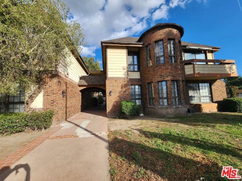 Photo of 7632 Topanga Canyon Boulevard #212, Canoga Park, CA 91304 (MLS # 26104950)