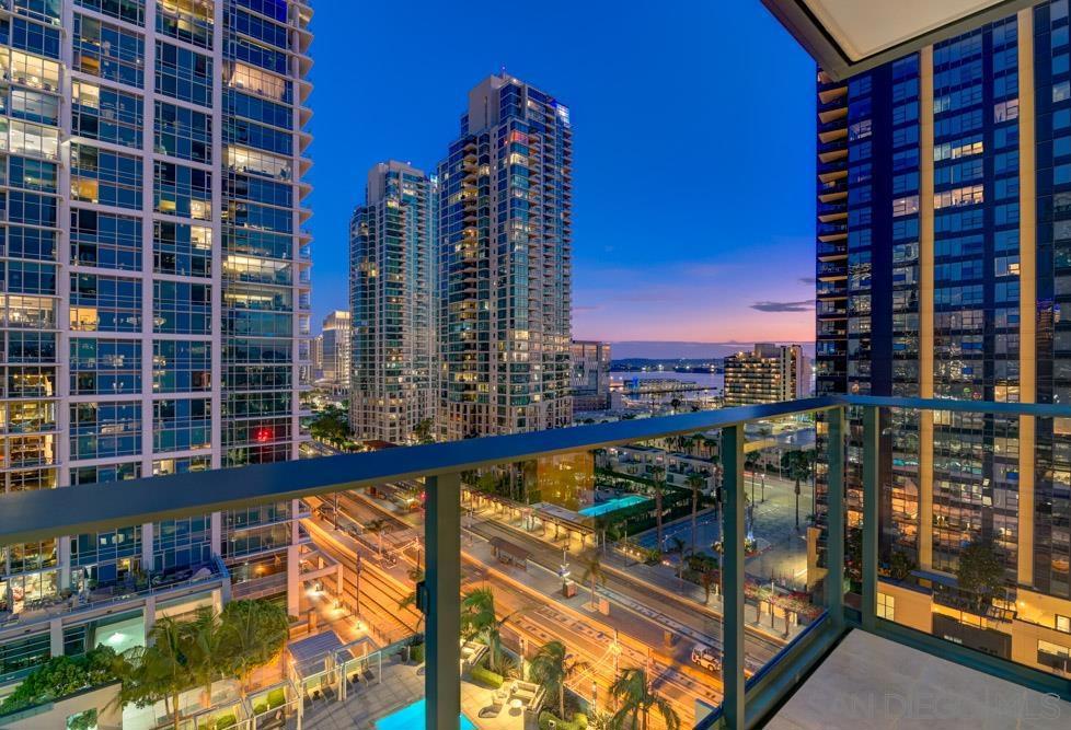 Enjoy the panoramic city and water views from this middle home at Savina! This 2 bedroom, 2 bathroom residence features wood flooring, Thermador appliances, gas cooktop, 1 parking space and amazing city and water views from the balcony! Building amenities include a heated pool, jacuzzi, wet and dry sauna, exercise room, pet retreat, pet wash, bicycle locker and tune up station, 24-hour lobby attendant, business center, EV charging station and more! Owner pays for HOA dues. Tenant pays for building move-in/move-out fees, water, SDGE, cable and internet. Excellent credit required. Home is available for move-in September 1st.