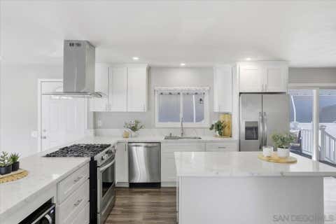 Photo of 7023 San Bartolo St #41, Carlsbad, CA 92011 (MLS # 260004763SD)