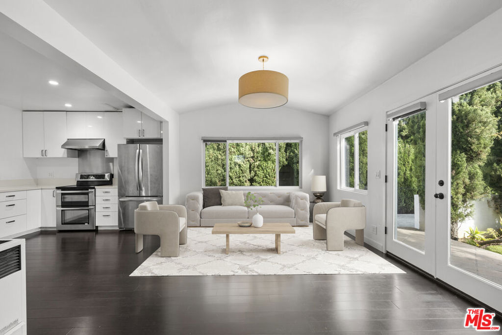 Tucked away on a peaceful, tree-lined cul-de-sac in the heart of beautiful Santa Monica, this charming and thoughtfully updated stand-alone two-bedroom, one-bathroom home offers the perfect blend of comfort, style and privacy. Bathed in natural light throughout, the interior features rich hardwood floors, upgraded appliances and the convenience of an in-unit washer and dryer. Enjoy the serenity of your own private front yard, ideal for morning coffee, weekend gatherings, or simply relaxing in the sun. Move-in ready and full of warmth, this inviting Santa Monica residence is the perfect place to call home. With two dedicated parking spaces, you'll have both convenience and peace of mind in this prime Westside location.