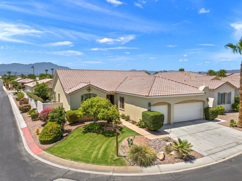 Beautiful and Popular San Benito Plan at Sun City Shadow Hills. Two bedrooms plus double den area and two baths in 2147 sqft. Private corner lot location close to a very nice dog park surrounded by sunshine and views.Original owner has taken great care of this home and is ready to move on to be closer to their children.Property can be sold furnished so new owner can move right in and enjoy all of the wonderful amenities Sun City has to offer.Golf, tennis, pickleball, lap pool, billiards, full security and so much more.