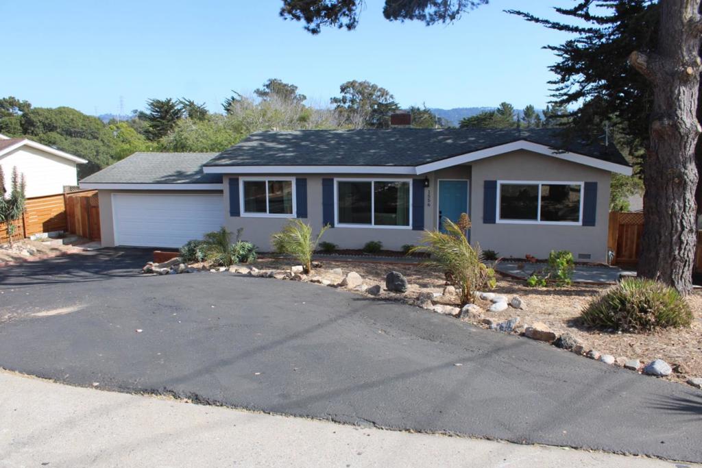 Welcome to this charming 3-bedroom, 1 1/2-bathroom home nestled in the famed Kimble area of Seaside. The property boasts a generous lot size of over 10,000 square feet, offering space and potential for a variety of outdoor activities. Step inside to find a cozy living room with a wood-burning fireplace. A dining living room area, perfect for entertaining guests. The kitchen features a new gas cooktop, catering to all your culinary needs. Enjoy the warmth and ambiance of the central forced air heating system during cooler months. Hardwood and laminate flooring stretches throughout the home, providing both style and durability. Laundry chores are made convenient with an in-garage setup, streamlining your daily routine. The home is located within the Monterey Peninsula Unified School District, serving the educational needs of the community. With a spacious 2-car garage with an automatic opener, this home is ideal for those seeking comfort and practicality in a pleasant neighborhood. This home may also qualify for an ADU unit.