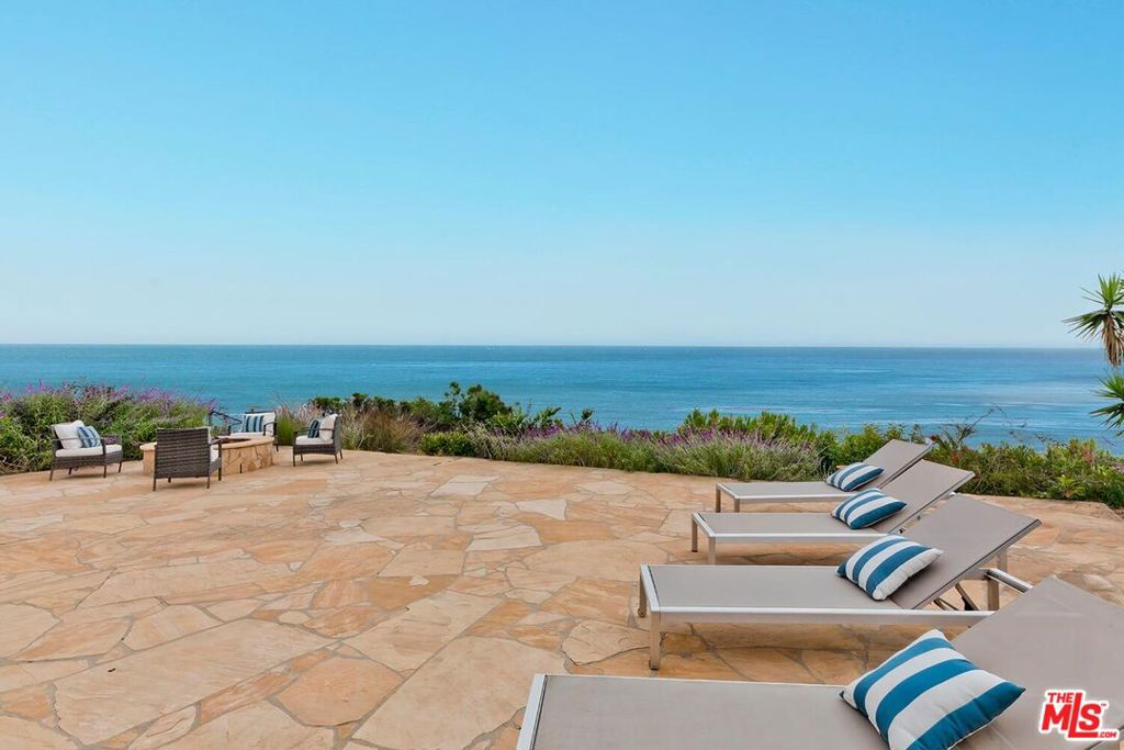 Situated in the seaside community of Sunset Mesa and perched above the Pacific Ocean and beloved Getty Villa Museum, this dreamy one-level home has some of the most expansive, unobstructed and sweeping views you will find in this enclave. Upon entering, you are enveloped by the warmth and beauty of the pristinely designed and meticulously curated finishes that capture the essence of luxurious coastal living. A seamless fusion of indoor and outdoor living spaces invites you to unwind and indulge in the luxury of relaxation. No expense was spared in creating this special residence boasting hardwood plank floors, Viking & Bosch appliances, skylights, custom cabinetry, wood plantation shutters, solar panels and more. Featuring 3 bedrooms (full ocean view from Primary suite) and 2.5 bathrooms with a substantial great room that opens to the stone patio which enjoys a fire pit, lush landscaping and EXPANSIVE views that include the Santa Monica Pier & Ferris Wheel and Palos Verdes Penninsula, plus it's a perfect place from which to experience and enjoy the boats on the water and 4th of July fireworks. As if that's not enough, enjoy scenic mountain views from the front yard. Just minutes to the beach and easy access to Malibu, Topanga, Santa Monica, the San Fernando Valley and beyond. Neither Seller nor Broker/Agents guarantee the accuracy of the square footage, lot size, permits or other information concerning the conditions or features of the property. Buyer is advised to independently verify the accuracy of all information (including square footage) through personal inspections and with the appropriate professionals. See DOCS for Offer Guidelines. All mirrors excluded.