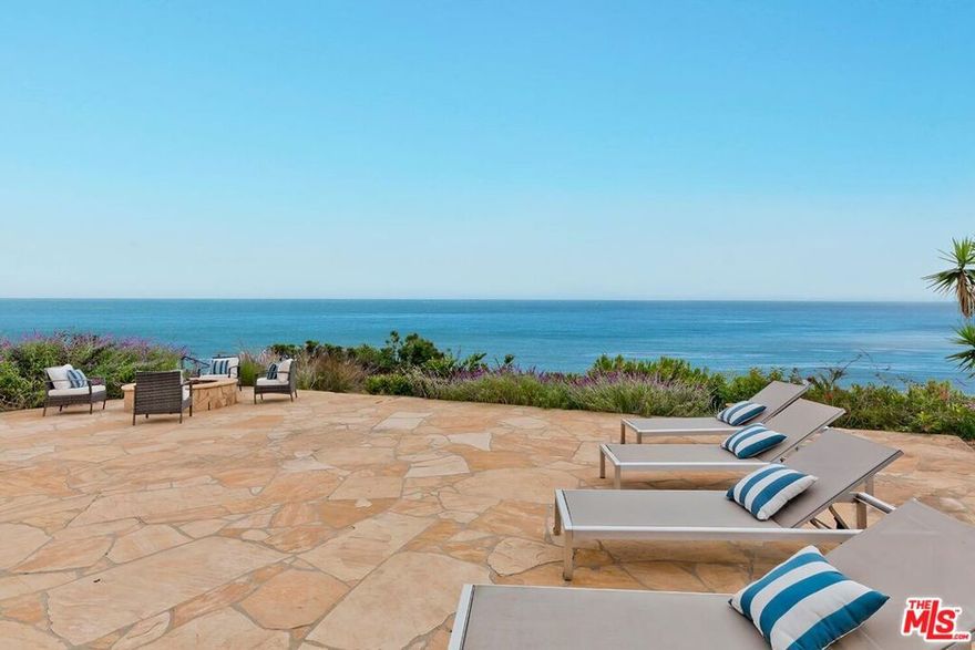 Situated in the seaside community of Sunset Mesa and perched above the Pacific Ocean and beloved Getty Villa Museum, this dreamy one-level home has some of the most expansive, unobstructed and sweeping views you will find in this enclave. Upon entering, you are enveloped by the warmth and beauty of the pristinely designed and meticulously curated finishes that capture the essence of luxurious coastal living. A seamless fusion of indoor and outdoor living spaces invites you to unwind and indulge in the luxury of relaxation. No expense was spared in creating this special residence boasting hardwood plank floors, Viking & Bosch appliances, skylights, custom cabinetry, wood plantation shutters, solar panels and more. Featuring 3 bedrooms (full ocean view from Primary suite) and 2.5 bathrooms with a substantial great room that opens to the stone patio which enjoys a fire pit, lush landscaping and EXPANSIVE views that include the Santa Monica Pier & Ferris Wheel and Palos Verdes Penninsula, plus it's a perfect place from which to experience and enjoy the boats on the water and 4th of July fireworks. As if that's not enough, enjoy scenic mountain views from the front yard. Just minutes to the beach and easy access to Malibu, Topanga, Santa Monica, the San Fernando Valley and beyond. Neither Seller nor Broker/Agents guarantee the accuracy of the square footage, lot size, permits or other information concerning the conditions or features of the property. Buyer is advised to independently verify the accuracy of all information (including square footage) through personal inspections and with the appropriate professionals. See DOCS for Offer Guidelines. All mirrors excluded.