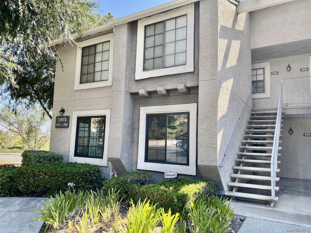 Enjoy your morning coffee on your peaceful, private balcony with mountain views! This beautiful 2 bedroom 1 bath top floor end unit boasts extra windows and a wood burning fireplace. Spacious balcony with secure storage. Full size washer and dryer in unit. Parking includes two oversized spots, one covered and are conveniently located in front of the unit. Ample guest parking throughout the community. Community features 2 pools, hot tub, sauna, tennis courts, basketball courts, exercise room, club House and secured mail room. Walking distance to retail, dining, Costco & award winning Poway schools.