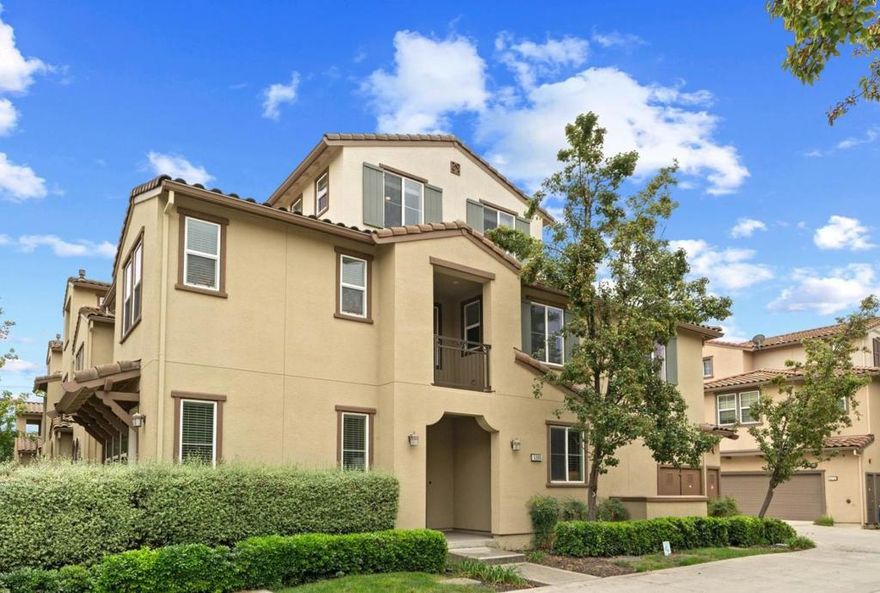 Spacious North-facing townhome in the desired Fioli Loop community! End unit provides extra natural light & only 1 shared wall. Step inside to see tall ceilings. The ground level includes a spacious living room with fireplace, large dining room, powder room, and Kitchen. Chef's Kitchen offers granite countertops, beautiful backsplash, stainless steel appliances, gas range, pantry/storage closet. The second level offers two spacious bedrooms with walk-in closets, family room, laundry room, and master bedroom suite. The master bedroom is a retreat with built-in office area, balcony access, large walk-in closet, and double-sink bathroom including a water closet. The third level bonus room is perfect as an office, play room, gym, guest room, or home theater with a serene view of the hills. Enjoy comfortable temperature year-round with dual zone heat/AC and double pane windows. Faster internet via wall Ethernet outlets, cheaper utilities with tankless water heater, 240V Electric Vehicle charging outlet in the 2-car side by side garage. Top rated schools in the San Ramon Valley Unified School District! Located nearby parks, trails, Trader Joes, Safeway, and City Center Bishop Ranch.