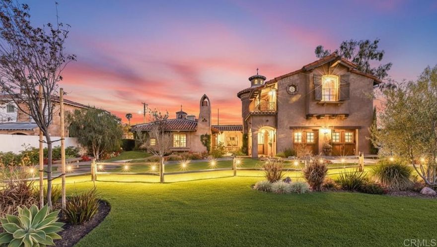 A landmark estate on the highly coveted Santa Clara Avenue in the heart of Dana Point’s iconic Lantern District, this Italian-inspired villa is a true masterpiece. Designed by Giovanni Miscione and inspired by the coastal charm of the village of Agnone, Italy, Villa della Famiglia captures the essence of old-world character while embracing the luxuries of modern living. Every detail has a story to tell. The rugged stone exterior, handcrafted ironwork, and rich wood accents give the home a sense of permanence and soul. Step through the towering entrance and you’re met with soaring ceilings and dramatic lighting that set the tone for a home that transcends trends and endures through generations. At its heart, the gourmet kitchen is designed for both elegance and utility. A grand island and farmhouse sink anchor the space, while a professional-grade Wolf gas range and Sub-Zero refrigerator make entertaining effortless. The kitchen flows seamlessly into the formal dining area and family gathering space, where a cozy fireplace invites conversation and connection. Two primary ensuites on the main level offer comfort and privacy, each with walk-in closets. One includes a roll-in shower for easy accessibility, and the other opens directly to the patio for seamless indoor-outdoor living. Upstairs, two spacious bedrooms each enjoy private balconies that catch the ocean breeze, while a versatile bonus room can flex to your lifestyle - a home office, media lounge, or quiet retreat. Outside, the home feels like its own private sanctuary. Gather around the stone fireplace for alfresco dinners, relax on the lawn, or simply breathe in the ocean air that drifts through this harbor-adjacent haven. Every inch is designed to be lived in and loved. Even the garage is show-stopping. With open beam ceilings, warm wood tones, artisan barn-style double doors, and a display worthy tool workstation, it’s as beautiful as it is functional. The home also features an intuitive whole-home smart system, giving you effortless control of climate, lighting, security, and sound. Just steps from Dana Point Harbor, fine dining, and pristine beaches, this villa offers more than a place to live - it’s a lifestyle investment.  Few homes on Santa Clara Avenue offer such craftsmanship, location, and timeless design. It’s not simply a home; Villa della Famiglia is a legacy, crafted to be cherished for generations.