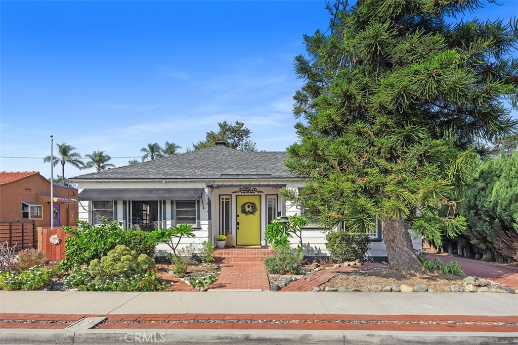 Two Homes on One Lot in the Heart of Orange!
Incredible investment opportunity on one of the most charming streets in the City of Orange! This centrally located, fully leased income property features two detached homes on one lot, generating $7,000/month in rental income.
The front house, originally built in 1947 and thoughtfully remodeled, is approximately 1,277 sq ft and currently leased furnished for $4,200/month. This stylish 2-bedroom, 1-bath home includes a sunroom that has been converted into a third bedroom . Inside, you'll find large windows, an open-concept living and dining space, and a farmhouse kitchen with stainless steel appliances, a farmhouse sink, and French doors. The home is equipped with central heating and AC, and the private covered patio includes a TV, ceiling fan, and seating area—perfect for relaxing or entertaining.
The back house is a separate 2-bedroom, 1-bath unit measuring approximately 640 sq ft, currently leased furnished for $2,800/month. It features skylights, concrete floors, copper plumbing, vaulted ceilings with ceiling fans, wall-mounted AC, and stainless steel appliances. Full of character and natural light, this space is equally appealing to tenants.
Whether you're an investor seeking strong cash flow or a buyer looking for a flexible multi-generational living setup, 130 N Lester Dr is a must-see!