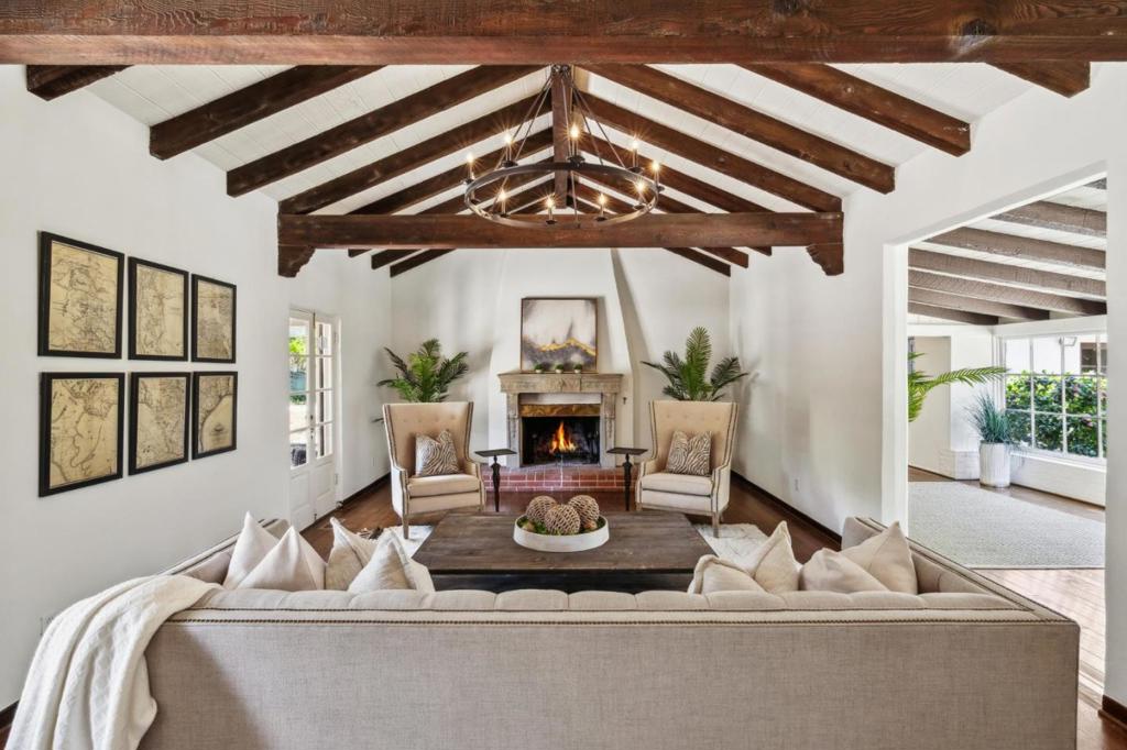 Welcome to Casablanca, a timeless masterpiece nestled in the coveted Peters Gate neighborhood of Monterey. The enchanting Spanish Revival home built in 1930 still has the charm and original details preserved throughout. Set on an expansive 1/2 acre lot, Casablanca offers a serene and private retreat with the energy of downtown Monterey just moments away. Step inside, you'll be captivated by the preserved original hardwood floors and intricate metal ironwork, showcased on the stairwell banister of the curved stairs to the upper floor. The elegant great room features open beam ceiling and fireplace crowned by a stately stone mantle. With five bedrooms and five and a half bathrooms, Casablanca provides ample space for both relaxation and entertaining. There are 2 primary suites, offering flexibility and convenience. One suite is located on the main level, the second suite and additional guest bedrooms reside on the upper floor. Casablanca has been lovingly cared for by its current owner since 1989 and is now ready for its next caretaker to continue its legacy. The home stands as a true classic, ready for restoration to its original splendor. Experience the allure of Monterey living with Casablanca, where history, charm, and location converge in perfect harmony.