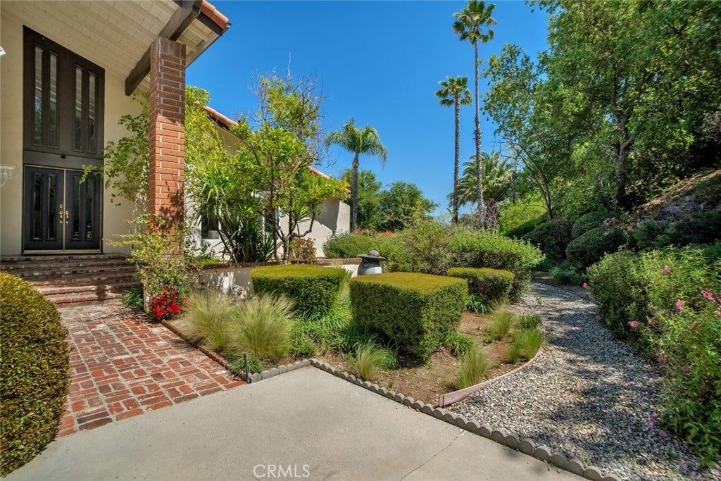 Photo of 20138 Greenbriar DR, Tarzana, CA 91356 (MLS # GD26106235)