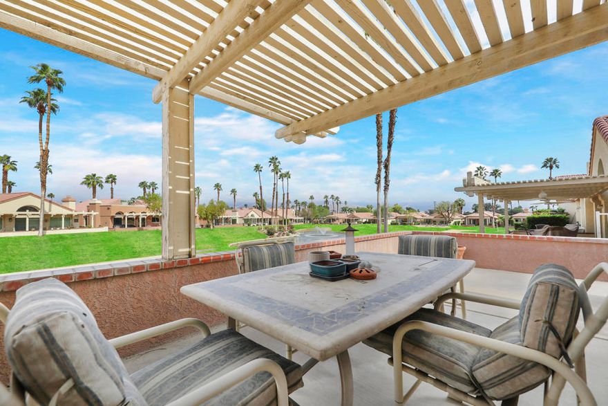 Wonderful location right on the 15th tee box inside the Oasis Country Club. This 3BR/2BA single story attached end unit condo offers open living space with vaulted ceilings. plantation shutters, fireplace and a large patio with spectacular views. Master Bedroom is spacious, has s a walk in closet and private patio.  The Oasis CC offers many amenities, golf, practice area for hitting golf balls, tennis, pickle ball, 18 hole putting course, 18 pools and spas, fitness room & a doggie park. The clubhouse offers two restaurants, one is casual dining in The Grille and the other is the larger dining room and lounge and banquet rooms. The Oasis CC is centrally located in Palm Desert and close to world class amenities and activities.