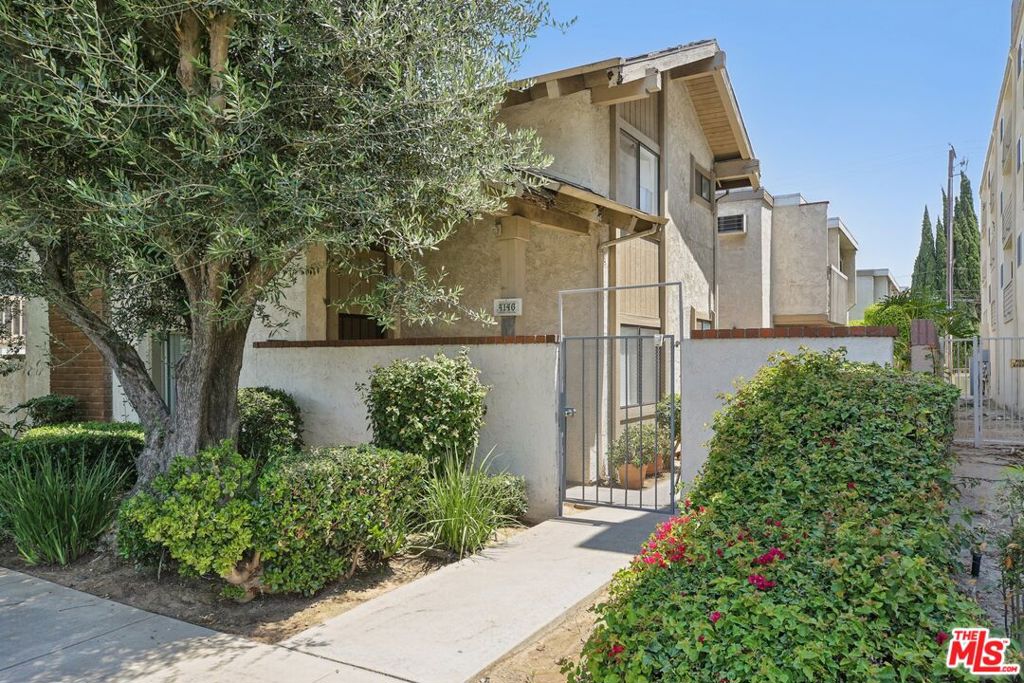 This 921 sq ft Long Beach condo where style meets practicality. Located on the sunlit upper level of a gated Bixby Knolls community, this 2-bedroom, 2-bathroom home features an open floor plan with warm wood-style flooring throughout, creating a seamless and inviting living space.The kitchen includes granite countertops, wood cabinetry, a gas range, dishwasher, and refrigeratoroffering simple, functional utility. Both bedrooms are filled with natural light from large windows, and mirrored closet doors enhance the sense of space. Two full bathroomsone en suitesupport a flexible and comfortable layout.Additional features include a new A/C unit, ceiling fans in the main living areas, dual-pane windows, and a private balcony for added comfort and flow. The unit also comes with a private garage, on-site community laundry, and secure gated entry.Built in 1977 and conveniently located near shops, dining, and freeway access, this unit offers a well-balanced lifestyle in one of Long Beach's most established neighborhoods.