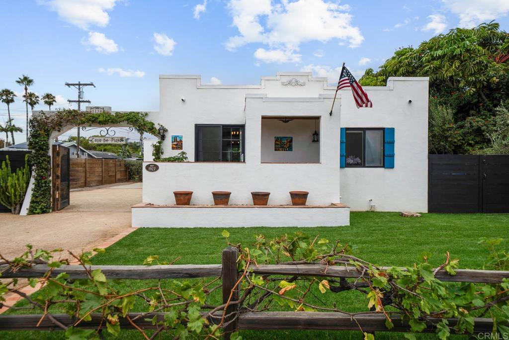 Step back in time and into the romance of Old Mexico and early California with this 98- year-old colonial Spanish bungalow, gracefully set on nearly a quarter- acre, this rare retreat offers both space as well as seclusion, in the highly sought-after Carlsbad Village. Behind the gated entrance, a welcoming courtyard evokes the charm of a mini hacienda- a serene space for morning coffee, intimate gatherings, or simply basking in the coastal breeze. This distinctive, light-filled retreat offers an airy open floor plan with an abundance of fresh air and ocean breezes. This home's timeless architecture blends warmth and history, offering authentic character rarely found today. A unique and beautiful feature is a hidden speakeasy-style cellar adds a whisper of whimsey and character, ideal for wine, storage or creative flex space. The lush grounds are a true gardener's and gourmet's dream, boasting 6 varieties of avocado trees along with lemon, orange, tangerine, loquat, pomegranate and olive trees. Whether you envision preserving its vintage soul or enhancing it with modern touches, this unique property offers a rare opportunity to own a piece of Carlsbad's living history, all within strolling distance of the village's lively cafe's, boutiques, coaster, and the beautiful beaches. Must see this hidden gem to fully appreciate.