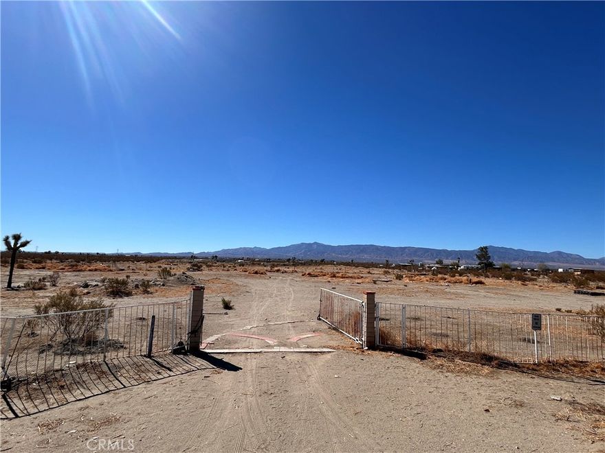 This property sits on approximately 4.69 acres of land. Located in the city of Phelan, just North of Highway 18. Parcel on some sites states public, this has not been confirmed by the seller(s) or listing brokerage, buyers responsibility to confirm utilities, conditions of land, if trash is present, and complete all aspects of due diligence to their satisfaction.