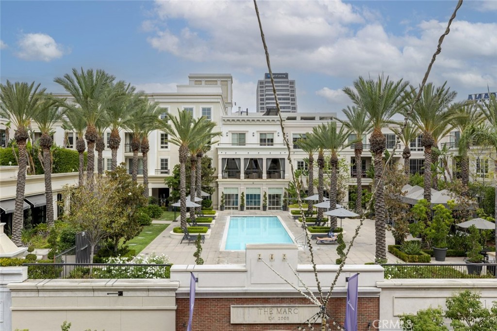 Luxurious and rarely available, this 2-bedroom, 3-bathroom condo for lease is located in the prestigious North Tower of the Americana at Brand at 407 Caruso Ave, offering the ultimate in upscale urban living. Spanning 1,531 sq ft, this beautifully designed residence features an open-concept layout with elegant finishes throughout, a cozy fireplace in the living room, and a full-size laundry room for added convenience. The gourmet kitchen flows seamlessly into the dining and living areas, making it ideal for both everyday living and entertaining. The private balcony allows for a breathtaking views overlooking the lively Americana shopping street and the resort-style swimming pool below, truly a rare vantage point. The spacious primary suite includes a spa-inspired bathroom, while the second bedroom is perfect for guests, a home office, or additional living space. A detached 2-car garage is included, along with access to full-service amenities, all just steps from world-class dining, shopping, entertainment, and beautifully landscaped grounds. This is luxury leasing at its finest in one of Glendale's most coveted communities.