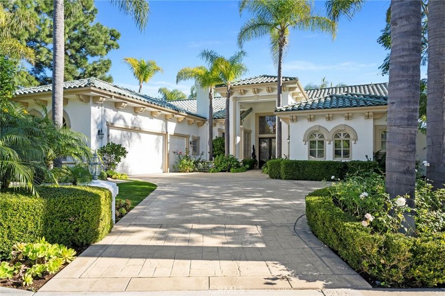 Exquisite single-story estate located in the prestigious guard-gated community of South Peak in Laguna Niguel. This custom home sits on an impressive 16,000 sq ft lot with approximately 3,804 sq ft of refined living space. Enter through exquisite leaded-glass doors into a grand rotunda foyer that leads to the formal living room, complete with a fireplace and elegant glass doors that open seamlessly to an outdoor oasis, also featuring three bedrooms, each with its own en-suite bath. The primary suite is spacious and secluded, featuring a fireplace that adds warmth and ambiance, french doors that open to the backyard and a separate sitting room. The luxurious en-suite bath boasts quartz countertops, a walk-in shower, a jacuzzi tub and a spacious walk-in closet. The impeccable gourmet kitchen features quartz countertops, premium stainless steel appliances which opens to a welcoming family room perfect for hosting family and friends.  A dedicated office with custom cabinetry and a chandelier adds sophistication.  The outdoor area is a private resort style oasis with a saltwater pool, spa, BBQ area, patio with outdoor heaters and a backup generator ensures piece of mind incase of power outage. Enjoy convenient access to biking and walking paths leading to the famous Salt Creek Beach,  two exclusive tennis clubs,  two world-class golf courses, the Five-Star Ritz Carlton and the renowned Waldorf Astoria Resort. This exceptional residence offers unmatched privacy, sophistication and a location that blends coastal charm with luxury resort living.