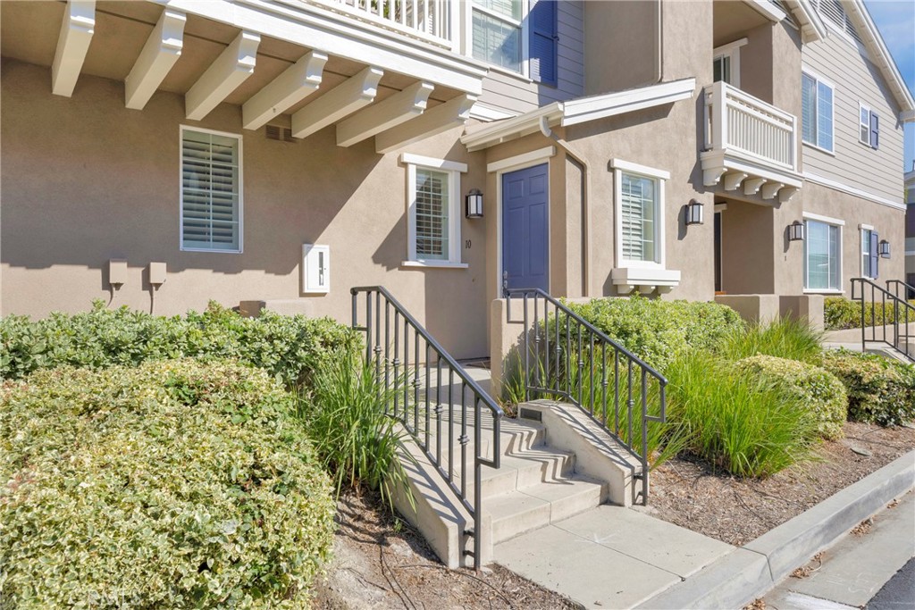 Welcome Home! Step inside this gorgeous Berkshire property located in the heart of Ladera Ranch. It has a great end unit location with an open floor plan, 2 bedrooms, 2 full baths & 2 spacious balconies. This beautiful home features a large dining and living area with a welcoming fireplace and a sliding glass door providing access to one of your relaxing balconies. Large and open kitchen with upgraded cabinets, stainless steel appliances, granite countertops tops and recessed lighting. The laundry is conveniently located inside, near the bedrooms. The spacious master suite has its own oversized balcony, walk-in closet, and dual vanities. Being an end unit, it allows for the light to beam in with lots of windows and plantation shutters throughout. Light and bright secondary bedroom with mirrored closet doors and a large secondary bathroom. Tile flooring in the kitchen, entry, and bathrooms. One car oversized attached garage as well as an assigned parking space steps away from the property. Walking distance to parks, award-winning schools & one of the many pools. HOA includes trash & Cox high-speed internet! Enjoy all the amenities Ladera Ranch has to offer, such as a water park, pools, spas, skate park, basketball & tennis courts, hiking & biking trails, and community events. Very close to shopping and restaurants.
