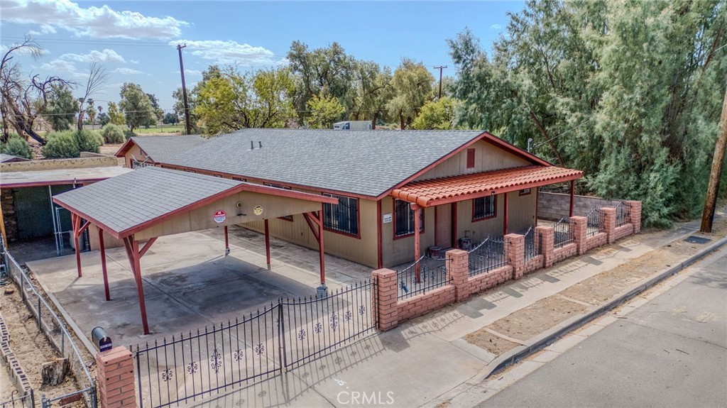 Looking for a River Home....this is it. Just a few blocks from the Colorado River, boat launch and the Needles Golf Course.
A welcoming home with an open floor plan as the living area and kitchen area are synonymous. This home has an extra room that could be used for a bedroom/office or den. There is a historic rock garage detached from the property and also another room with a closet and a/c unit. Another perk is the 2-car garage that is detached as well and alley access. And plenty of room for a garden if you wish.
This property is close to downtown Needles and about 15 minutes to town on the AZ side.