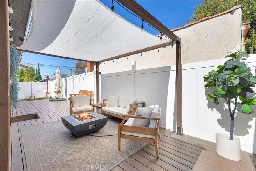 A Rare Long Beach Opportunity! Welcome to this absolutely charming duplex in the desirable Circle area - an unbeatable chance for buyers looking to house hack, invest, or enjoy the benefits of owner-occupied rental income. Sitting on an expansive private corner lot, this property blends modern upgrades with exceptional flexibility.  Two light-filled side-by-side units each offer 2 generously sized bedrooms, an updated bathroom, and their own large private patio. Recent improvements include a beautifully refreshed kitchen with newer appliances, luxury vinyl flooring, and a brand-new roof, giving future owners peace of mind from day one. Outdoor living shines here.....both patios are enclosed with vinyl fencing, ideal for breezy afternoon lounging. Unit A takes it up a notch with new decking, a pergola, and an adorable astro-turf lounge area—perfect for entertaining or relaxing in style. Each unit also features its own private one-car garage, laundry area, and additional driveway parking for a second vehicle.  Whether you choose to live in one unit while renting the other, rent both for cash flow, or create the ultimate multi-generational setup, this duplex delivers versatility and value in one of Long Beach’s most beloved neighborhoods.  Don’t miss out on this incredible opportunity to make the smartest move in today’s market!