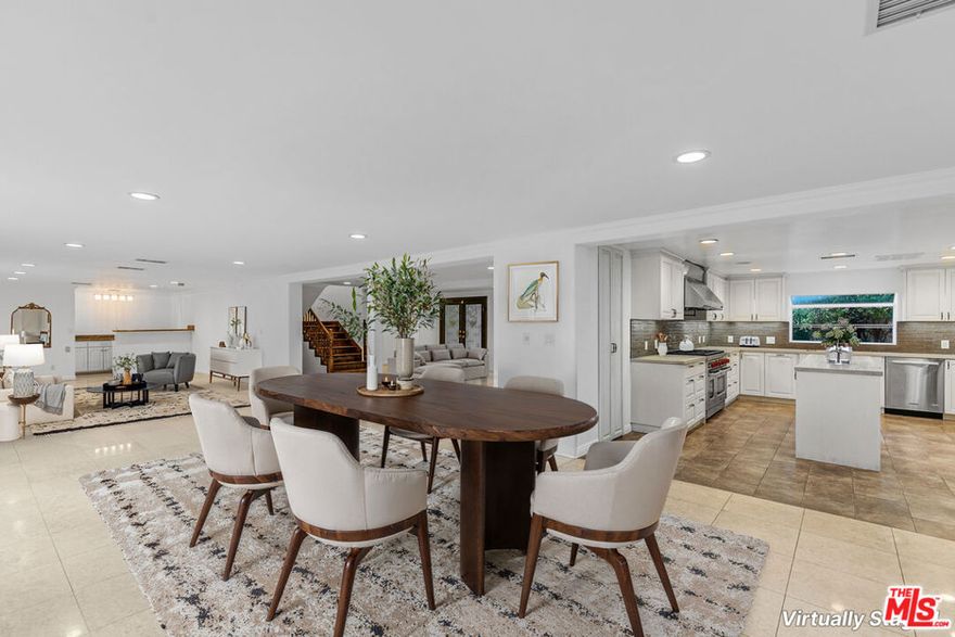 Here's the thing about 19016 Wells: she's not some shiny new build trying to prove herself. She's established. Composed. The kind of house that knows exactly who she is and doesn't need to over explain it. At over 4,500 square feet, this 4-bedroom, 4-bath Tarzana estate delivers space to the MAX. Every room feels open, easy, and built for real living. Wide halls, high ceilings, and that unbothered energy that only comes with experience. Behind the gates, a circular driveway sets the scene. There's a two-car garage and enough parking for everyone you've ever promised to have over "sometime soon." The front entrance is lush and tropical, a little Beverly Hills, a little Palm Springs, and fully ready for your grand arrival. Inside, the flow is seamless. Just in time for the holiday season, the kitchen is generous, bright, and unapologetically practical, with enough counter space to spread out and enough style to host with confidence. The living areas stretch wide and open, perfect for gatherings that start casual and end with everyone barefoot, laughing, and staying too long. Upstairs, the bedrooms mean business. Each one is oversized, airy, and calm  a rare kind of spacious that makes mornings feel less like chaos and more like ceremony. The primary suite is the quiet showstopper: serene light, generous scale, and that irresistible "five more minutes" feeling that makes weekends last longer.The bathrooms carry a hint of vintage charm, roomy and relaxed, with just the right amount of character to remind you that perfect is overrated.Out back, it's pure California. The yard is sprawling and private, with gardens that feel like a well-kept secret and a fenced pool that practically hums "summer." There's a shaded BBQ cabana made for lingering meals, a green lawn that begs for barefoot afternoons, and just enough space to pull off a serious party without breaking a sweat. Gardener and pool service are included, because luxury should feel effortless. Located in the heart of Tarzana, you're close to Ventura Boulevard's best spots  Blu Jam for brunch, House of Taka for sushi, a dozen coffee shops that take their latte art seriously, and miles of nearby hiking trails when you want a little nature with your city life.19016 Wells doesn't shout. She doesn't chase. She's confident, comfortable, and quietly magnetic. The kind of home that makes you want to slow down, stay longer, and enjoy every square foot of it.