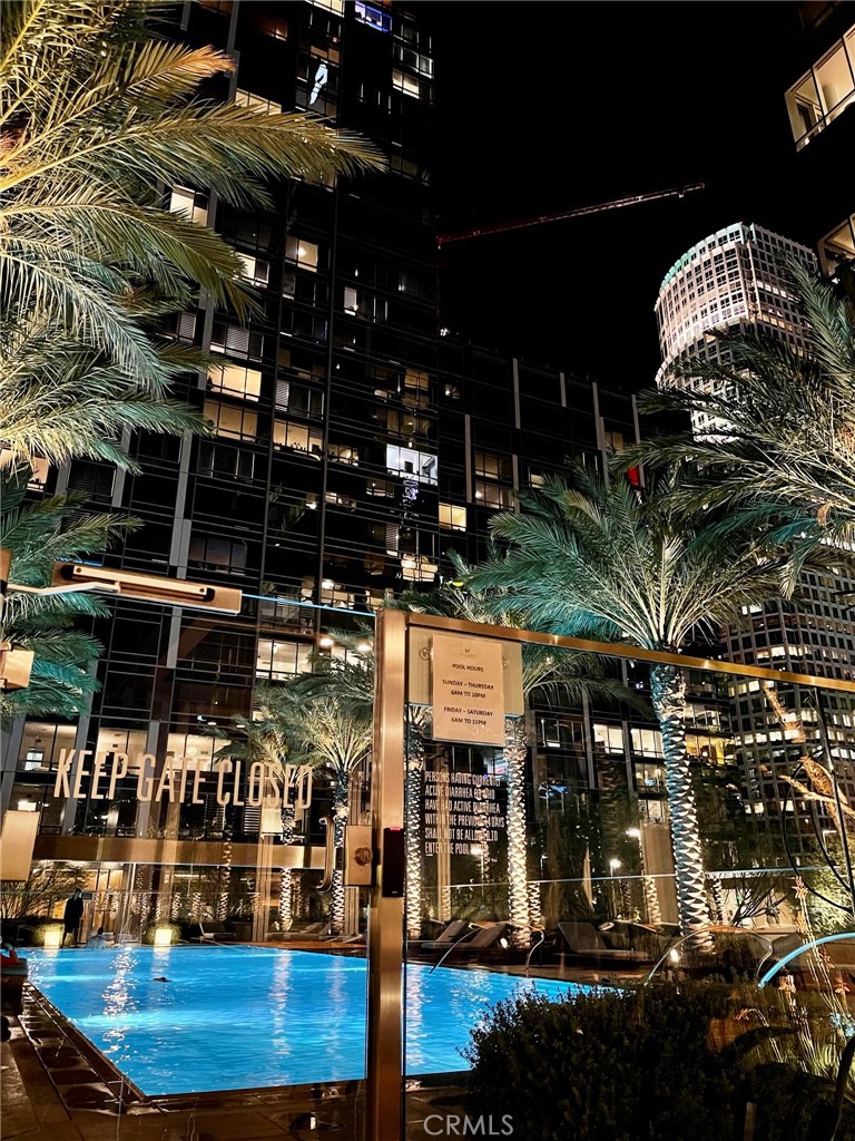 Rare opportunity  to purchase a fully furnished unit in the new luxury Metropolis High Rise Condo Tower II with rare to find large balcony.  This unit featuring custom built cabinets, soaking bathtub, laundry and washer and dryer in the unit, impeccable city views and great amenities for enjoyment includes 24 hours security, resort style pool, fitness center, garden, firepit, relaxation area, billiard room, dog park, theatre room, business center, and special access to Hotel Indigo's dining and lounge which is right next door.  This special benefit at Hotel Indigo also great for when you have guests, but are still able to enjoy your own home without the hassle of hosting and giving up your personal space..  Location is unbeatable with easy access to 110,10,and 101 freeway,  this complex is also very close to Crypto.com arena, and all the famous districts and restaurants at your grasp.