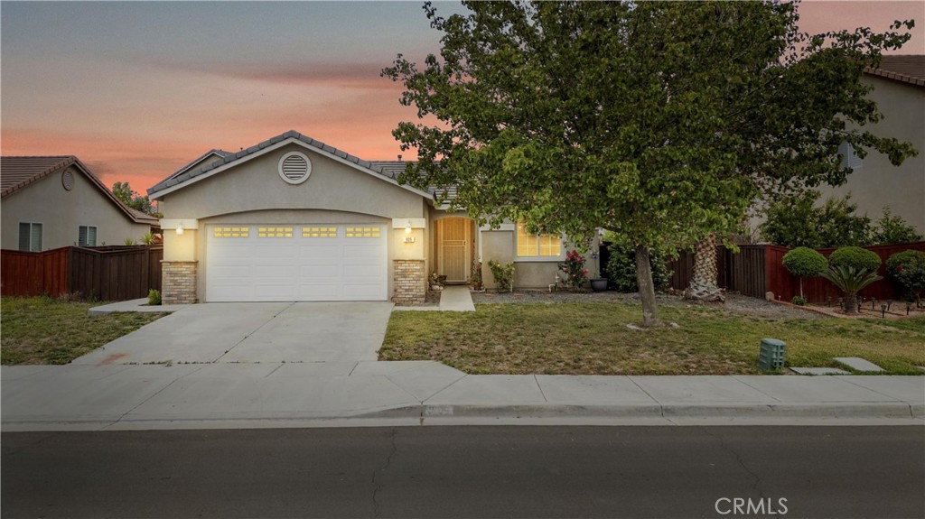 This move in ready, 1377 SF, 3 bedroom, 2 bath home is located in one of the most desirable neighborhoods in San Jacinto. Upon entering, you will immediately love natural lighting highlighted by the vaulted ceilings and tile floors throughout. The open concept kitchen features stainless steel appliances, newer countertops and oak cabnitry, while the adjacent living room is large, well lit and perfect for hosting others. The bedrooms all feature the warmth of newer carpet and paint, while the bathrooms are turnkey and ready for your personal touch. A large separate laundry room adds to this home's functionality.
The exterior features decorative rock wainscoting, mature landscaping in the front yard, and a large back yard that is a blank slate and ready for you to make it your own. Plenty of room to do almost anything you desire- even add a pool or RV parking! No HOA fees! This one won't last, so call today to schedule your private showing.