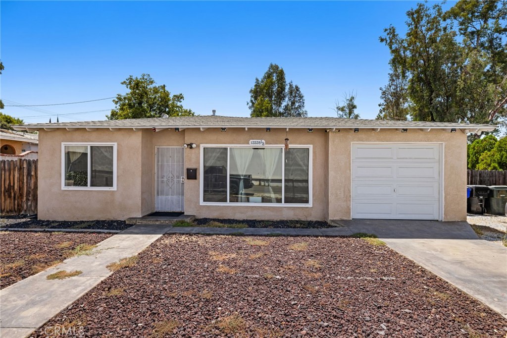 First time buyer programs available. Welcome to this well-maintained 2-bedroom, 1-bath home with a versatile bonus room located in the desirable city of Grand Terrace. Interior highlights include laminate flooring, granite countertops, and newer cabinetry, providing both comfort and functionality. The property also features a spacious backyard, ideal for entertaining, gardening, or future expansion. Conveniently situated near schools, shopping, dining, and easy freeway access, this home combines charm with convenience and is ready for its next owner.