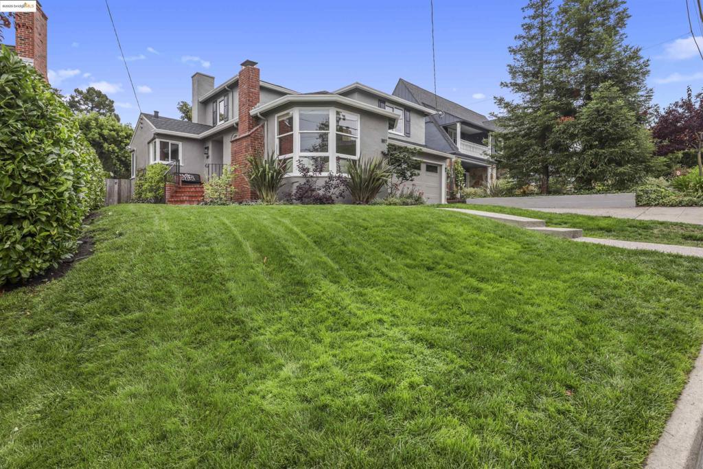 Discover Rosecrest Drive in Upper Oakmore, Oakland’s best-kept secret. This three-bedroom, two-bath home with original architectural details is situated on a flat parcel and includes a lovely family room with French doors opening to a sun-drenched garden, ideal for entertaining or simply unwinding. A spacious living room looks out over the large, lush front lawn through a stunning floor-to-ceiling corner bay window. Wood planks adorn the ceiling of the gracious dining room that flows seamlessly into the updated kitchen that opens to the rear garden patio. Upstairs bedrooms and a large hall bathroom provide a private refuge in this practical and charming home. Charge your electric vehicle with your own EV charger. The two-car garage offers interior access into the home near the laundry room and a convenient lower-level bath. This quiet and desirable neighborhood is easily accessible while maintaining the community of neighbors you have always wanted.